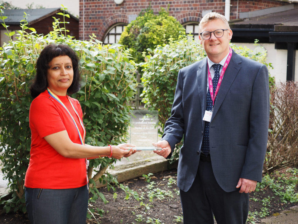 Mathematics Teacher, Rekha Patel getting an award