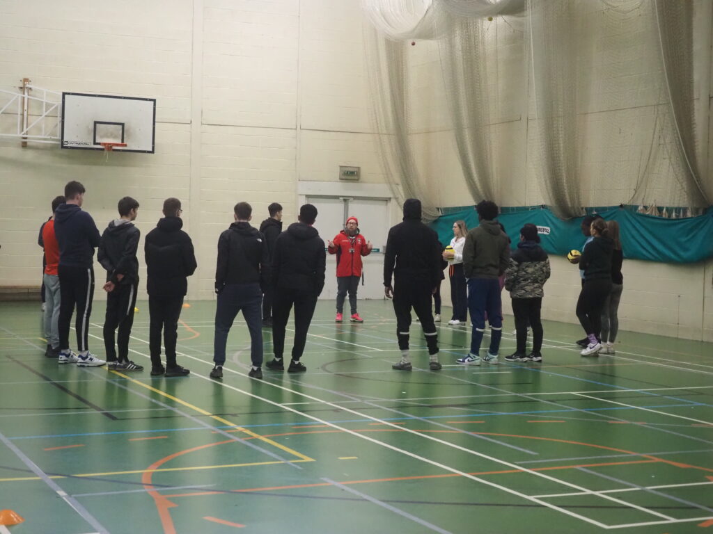 Students participating in sports enrichment for additional leadership and coaching skills supported by a Leicester Tigers coach